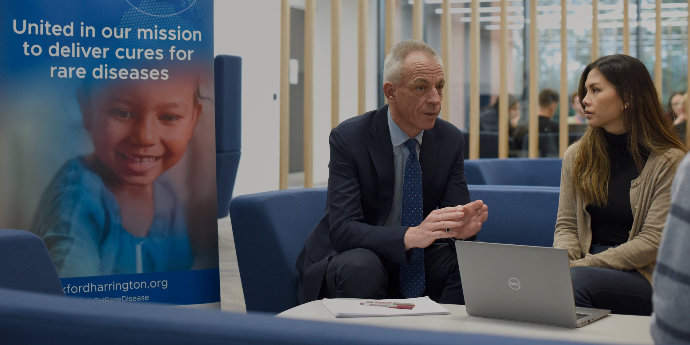 Three people in discussion 